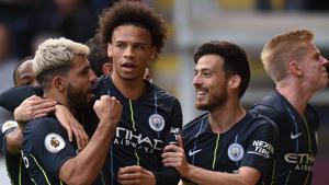 Manchester City's Sergio Aguero (L) celebrates scoring the opening goal withLeroy Sane (2L) and David Silva (2R).(AFP) Manchester City's Sergio Aguero (L) celebrates scoring the opening goal withLeroy Sane (2L) and David Silva (2R).(AFP)