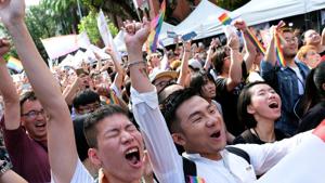 Same-sex marriage supporters celebrate after Taiwan became the first place in Asia to legalize same-sex marriage, outside the Legislative Yuan in Taipei(REUTERS) Same-sex marriage supporters celebrate after Taiwan became the first place in Asia to legalize same-sex marriage, outside the Legislative Yuan in Taipei(REUTERS)