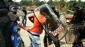 Policemen in action after the clashes between two groups during second phase of Lok Sabha election as violence took place in Chopra, North Bengal, on Thursday.(ANI file photo)