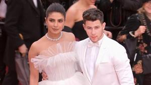 <p>Actor Priyanka Chopra and singer-husband Nick Jonas walked the red carpet at Cannes Film Festival. The couple were twinning in white and set new couple goals. Priyanka wore a ruffled off-shoulder Georges Hobeika gown while Nick looked dapper in a white suit. The couple arrived for the screening of french film 'The Best Years of a Life'. </p>