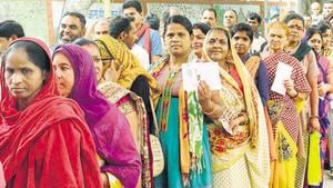 Madhya Pradesh, May 12 (ANI): Female voters in a long queue wait outside a polling booth to cast their vote for sixth phase of Lok Sabha elections in Bhopal on Sunday. (ANI Photo)(ANI) Madhya Pradesh, May 12 (ANI): Female voters in a long queue wait outside a polling booth to cast their vote for sixth phase of Lok Sabha elections in Bhopal on Sunday. (ANI Photo)(ANI)