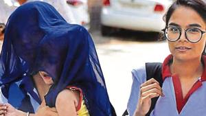 A woman shields her child from the sun on Monday, when the day temperature soared in Gurugram(Yogesh Kumar /HT) A woman shields her child from the sun on Monday, when the day temperature soared in Gurugram(Yogesh Kumar /HT)