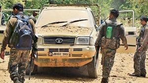 Special Auxiliary Police (SAP) jawans with Jharkhand Armed Police (JAP) inspect the site of landmine blasts triggered by Naxals during an encounter with the security forces, at Hundhada(PTI) Special Auxiliary Police (SAP) jawans with Jharkhand Armed Police (JAP) inspect the site of landmine blasts triggered by Naxals during an encounter with the security forces, at Hundhada(PTI)