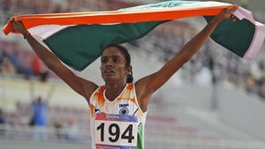 India's Gomathi Marimuthu celebrates after winning gold in the women's 800-meters final race.(AP) India's Gomathi Marimuthu celebrates after winning gold in the women's 800-meters final race.(AP)