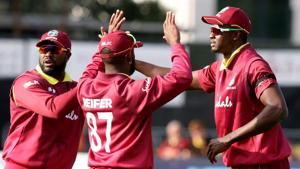 West Indies' captain Jason Holder (R) celebrates with teammates after taking the wicket of Bangladesh's Tamim Iqbal.(AFP) West Indies' captain Jason Holder (R) celebrates with teammates after taking the wicket of Bangladesh's Tamim Iqbal.(AFP)