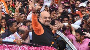 Bharatiya Janta Party (BJP) president Amit Shah shows a victory sign.(Sanchit Khanna/HT PHOTO) Bharatiya Janta Party (BJP) president Amit Shah shows a victory sign.(Sanchit Khanna/HT PHOTO)