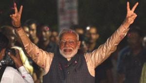 New Delhi, India - May 23, 2019: Prime Minister Narendra Modi shows victory sign as he, along with the party President Amit Shah, arrives at the party headquarters to celebrate their victory in the 2019 Lok Sabha elections, in New Delhi, India, on Thursday, May 23, 2019. (Photo by Arvind Yadav/ Hindustan Times)(Arvind Yadav/HT PHOTO)