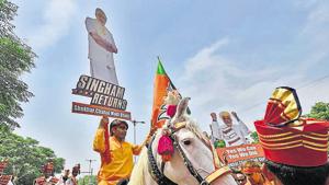 Bharatiya Janta Party (BJP) supporters celebrate the party's victory in the Lok Sabha Elections, at party headquarters, in New Delhi, India, on Thursday.(Burhaan Kinu/HT PHOTO) Bharatiya Janta Party (BJP) supporters celebrate the party's victory in the Lok Sabha Elections, at party headquarters, in New Delhi, India, on Thursday.(Burhaan Kinu/HT PHOTO)