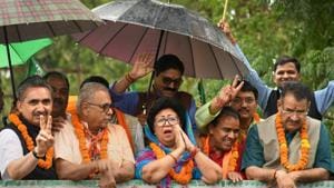 BJP candidate from Tehri seat Mala Rajya Laxmi Shah with state minister Dhan Singh Rawat and city mayor Sunil Uniagal Gamma in a roadshow after her victory in the Lok Sabha elections, in Dehradun, Friday, May 24, 2019.(PTI) BJP candidate from Tehri seat Mala Rajya Laxmi Shah with state minister Dhan Singh Rawat and city mayor Sunil Uniagal Gamma in a roadshow after her victory in the Lok Sabha elections, in Dehradun, Friday, May 24, 2019.(PTI)