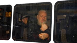FILE PHOTO: WikiLeaks founder Julian Assange is seen in a police van after was arrested by British police outside the Ecuadorian embassy in London, Britain April 11, 2019. REUTERS/Henry Nicholls/File Photo(REUTERS) FILE PHOTO: WikiLeaks founder Julian Assange is seen in a police van after was arrested by British police outside the Ecuadorian embassy in London, Britain April 11, 2019. REUTERS/Henry Nicholls/File Photo(REUTERS)