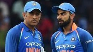 Indian captain Virat Kohli chats with wicketkeeper Mahendra Singh Dhoni(AFP/Getty Images) Indian captain Virat Kohli chats with wicketkeeper Mahendra Singh Dhoni(AFP/Getty Images)