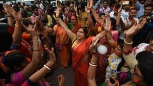 BJP supporters celebrate at the party’s headquarters in Kolkata on Thursday, May 23, 2019.(Arijit Sen/HT Photo) BJP supporters celebrate at the party’s headquarters in Kolkata on Thursday, May 23, 2019.(Arijit Sen/HT Photo)