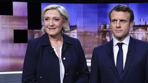 Macron, France’s youngest ever president, and Le Pen have a lot riding on the results of the polls which both have pitched as a re-run of their duel for the presidency two years ago.(Reuters) Macron, France’s youngest ever president, and Le Pen have a lot riding on the results of the polls which both have pitched as a re-run of their duel for the presidency two years ago.(Reuters)