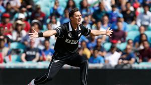 New Zealand's Trent Boult celebrates taking the wicket of India's Rohit Sharma(AFP)