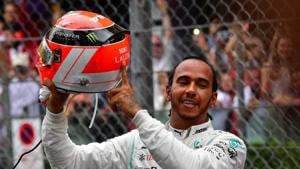 Mercedes' British driver Lewis Hamilton points at the name of late Formula One legend Niki Lauda on his helmet after winning the Monaco Formula 1 Grand Prix at the Monaco street circuit on May 26, 2019 in Monaco(AFP) Mercedes' British driver Lewis Hamilton points at the name of late Formula One legend Niki Lauda on his helmet after winning the Monaco Formula 1 Grand Prix at the Monaco street circuit on May 26, 2019 in Monaco(AFP)