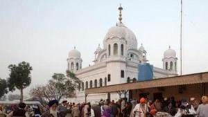 A man serves food to Sikhs from India outside the shrine of Guru Nanak Dev Ji, founder of Sikhism, during the groundbreaking ceremony of the Kartarpur border corridor.(Reuters/ File photo) A man serves food to Sikhs from India outside the shrine of Guru Nanak Dev Ji, founder of Sikhism, during the groundbreaking ceremony of the Kartarpur border corridor.(Reuters/ File photo)