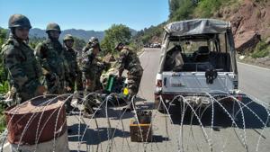 Security personnel cordon off the area where an Improvised Explosive Device was recovered at Kellar Chowk on Jammu-Poonch highway, in Rajouri district, Monday, May 27, 2019.(PTI) Security personnel cordon off the area where an Improvised Explosive Device was recovered at Kellar Chowk on Jammu-Poonch highway, in Rajouri district, Monday, May 27, 2019.(PTI)