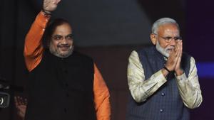 PM Narendra Modi (R) and Bharatiya Janta Party (BJP) president Amit Shah gesture to supporters as they celebrate the victory in India's general election at the party headquarters in New Delhi on May 23, 2019.(AFP file photo) PM Narendra Modi (R) and Bharatiya Janta Party (BJP) president Amit Shah gesture to supporters as they celebrate the victory in India's general election at the party headquarters in New Delhi on May 23, 2019.(AFP file photo)