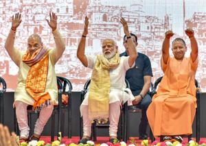 Prime Minister Narendra Modi with BJP President Amit Shah and UP chief minister Yogi Adityanath during a meeting with the party workers at Deen Dayal Upadhyay Hastkala Sankul in Varanasi, Monday, May 27, 2019.(PTI) Prime Minister Narendra Modi with BJP President Amit Shah and UP chief minister Yogi Adityanath during a meeting with the party workers at Deen Dayal Upadhyay Hastkala Sankul in Varanasi, Monday, May 27, 2019.(PTI)