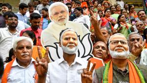 Modi supporters celebrate the BJP’s win, Bengaluru, May 23. In 2014, the BJP alliance got 43.37% of votes and 17 seats. In 2019, it got 55% of votes and 25 seats(AFP) Modi supporters celebrate the BJP’s win, Bengaluru, May 23. In 2014, the BJP alliance got 43.37% of votes and 17 seats. In 2019, it got 55% of votes and 25 seats(AFP)