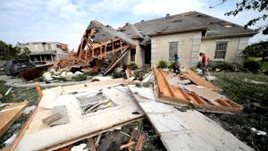 Neighbors in Clayton, Ohio gather belongings after houses were damaged after a tornado touched down overnight near Dayton, Ohio, U.S. May 28, 2019.(REUTERS) Neighbors in Clayton, Ohio gather belongings after houses were damaged after a tornado touched down overnight near Dayton, Ohio, U.S. May 28, 2019.(REUTERS)