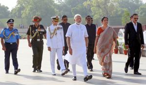 New Delhi: Prime Minister Narendra Modi along with Defence Minister Nirmala Sitharaman arrives to pay tribute at the War Memorial ahead of his swearing-in ceremony as the prime minister for the second consecutive term, in New Delhi, Thursday, May 30, 2019.(PTI) New Delhi: Prime Minister Narendra Modi along with Defence Minister Nirmala Sitharaman arrives to pay tribute at the War Memorial ahead of his swearing-in ceremony as the prime minister for the second consecutive term, in New Delhi, Thursday, May 30, 2019.(PTI)