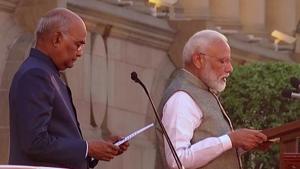 President Ram Nath Kovind administering the oath of office and secrecy to Prime Minister Narendra Modi for the second term at Rashtrapati Bhawan in New Delhi.(ANI PHOTO) President Ram Nath Kovind administering the oath of office and secrecy to Prime Minister Narendra Modi for the second term at Rashtrapati Bhawan in New Delhi.(ANI PHOTO)