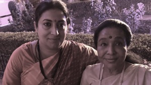 Tweeting a picture where she can be seen posing with Smriti Irani, she revealed that the newly-elected BJP MP from Amethi helped her reach home safely, considering the ‘crazy rush’ post the ceremony.(Twitter/ Asha Bhosle) Tweeting a picture where she can be seen posing with Smriti Irani, she revealed that the newly-elected BJP MP from Amethi helped her reach home safely, considering the ‘crazy rush’ post the ceremony.(Twitter/ Asha Bhosle)