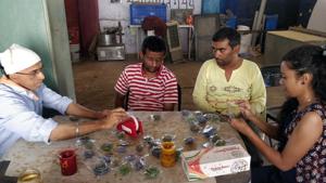PUMBA students visit Sadhana Village on Saturdays and help the inmates in making candles for sale and generate revenue.(HT/PHOTO) PUMBA students visit Sadhana Village on Saturdays and help the inmates in making candles for sale and generate revenue.(HT/PHOTO)