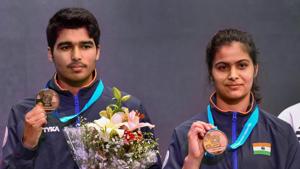 New Delhi: India's Manu Bhaker (R) and Saurabh Chaudhary pose for photographs with their gold medals after winning the 10m Air Pistol Mixed Team event at the ISSF World Cup Rifle/Pistol, in New Delhi, Wednesday, Feb 26, 2019.(PTI) New Delhi: India's Manu Bhaker (R) and Saurabh Chaudhary pose for photographs with their gold medals after winning the 10m Air Pistol Mixed Team event at the ISSF World Cup Rifle/Pistol, in New Delhi, Wednesday, Feb 26, 2019.(PTI)