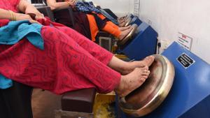 The smooth metal heats up as it is foot massaged and gives relief to people suffering from various physical ailments, including excessive body heat.(Pratham Gokhale/HT Photo) The smooth metal heats up as it is foot massaged and gives relief to people suffering from various physical ailments, including excessive body heat.(Pratham Gokhale/HT Photo)