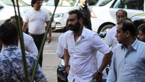 Ajay Devgn at a prayer meet of his father, late veteran action director Veeru Devgan, in Mumbai.(IANS) Ajay Devgn at a prayer meet of his father, late veteran action director Veeru Devgan, in Mumbai.(IANS)