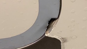 The cause of the hole is yet to be ascertained, an airline official said, adding that it could be due to a foreign object hitting the door during flight.(ANI/Twitter) The cause of the hole is yet to be ascertained, an airline official said, adding that it could be due to a foreign object hitting the door during flight.(ANI/Twitter)