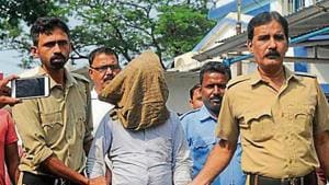 Kamruzzaman Sarkar, the 37-year-old suspected serial killer, is brought to the Kalna court for hearing, at Kalna, in East Burdwan district of West Bengal(Samir Jana / Hindustan Times)