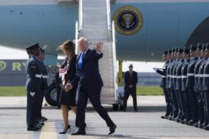 President Donald Trump waves as he and first lady Melania Trump arrive at Stansted Airport in England, Monday, June 3, 2019 at the start of a three day state visit to Britain.(AP photo) President Donald Trump waves as he and first lady Melania Trump arrive at Stansted Airport in England, Monday, June 3, 2019 at the start of a three day state visit to Britain.(AP photo)