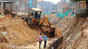 The Badhshapur nullah is an arterial storm water drain, which has been encroached upon in the recent years due to urban sprawl, reducing its carrying capacity and compromising the city’s ability to absorb rainfall.(HT Photo) The Badhshapur nullah is an arterial storm water drain, which has been encroached upon in the recent years due to urban sprawl, reducing its carrying capacity and compromising the city’s ability to absorb rainfall.(HT Photo)