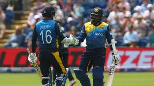 Sri Lanka's captain Dimuth Karunaratne (L) touches gloves with teammate Sri Lanka's Lasith Malinga(AFP) Sri Lanka's captain Dimuth Karunaratne (L) touches gloves with teammate Sri Lanka's Lasith Malinga(AFP)