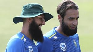 South Africa's Hashim Amla, left, and Imran Tahir attend a training session.(AP) South Africa's Hashim Amla, left, and Imran Tahir attend a training session.(AP)