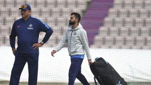 India's captain Virat Kohli, right, walks past team coach Ravi Shastri before batting in the nets during a training session ahead of their Cricket World Cup match against South Africa at Ageas Bowl in Southampton(AP) India's captain Virat Kohli, right, walks past team coach Ravi Shastri before batting in the nets during a training session ahead of their Cricket World Cup match against South Africa at Ageas Bowl in Southampton(AP)