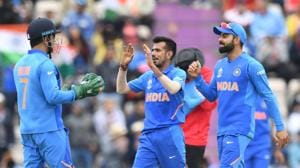 India's Yuzvendra Chahal (C) celebrates with India's Mahendra Singh Dhoni (L) and India's captain Virat Kohli after taking the wicket of South Africa's Andile Phehlukwayo for 34 during the 2019 Cricket World Cup group stage match between South Africa and India at the Rose Bowl in Southampton, southern England, on June 5, 2019.(AFP) India's Yuzvendra Chahal (C) celebrates with India's Mahendra Singh Dhoni (L) and India's captain Virat Kohli after taking the wicket of South Africa's Andile Phehlukwayo for 34 during the 2019 Cricket World Cup group stage match between South Africa and India at the Rose Bowl in Southampton, southern England, on June 5, 2019.(AFP)