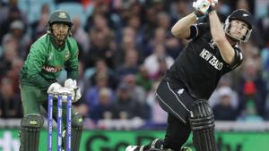 New Zealand's James Neesham hits a shot for six.(AP) New Zealand's James Neesham hits a shot for six.(AP)