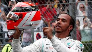Mercedes' Lewis Hamilton celebrates winning the Monaco Grand Prix after the race(REUTERS) Mercedes' Lewis Hamilton celebrates winning the Monaco Grand Prix after the race(REUTERS)