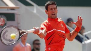 Serbia's Novak Djokovic in action during his quarterfinal match against Germany's Alexander Zverev.(REUTERS) Serbia's Novak Djokovic in action during his quarterfinal match against Germany's Alexander Zverev.(REUTERS)