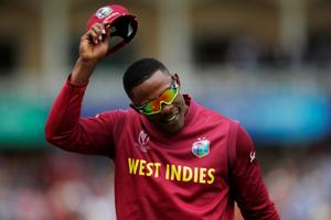 West Indies' Sheldon Cottrell celebrates his catch to dismiss Australia's Steve Smith.(Action Images via Reuters) West Indies' Sheldon Cottrell celebrates his catch to dismiss Australia's Steve Smith.(Action Images via Reuters)