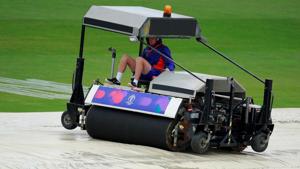 Groundstaff working during a rain delay in Bristol.(Action Images via Reuters) Groundstaff working during a rain delay in Bristol.(Action Images via Reuters)
