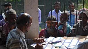 People wait to check their names on the first draft of the National Register of Citizens (NRC) at Goroimari of Kamrup district in the Indian state of Assam on January 1, 2018. Image used for representational purpose.(AFP/ File photo) People wait to check their names on the first draft of the National Register of Citizens (NRC) at Goroimari of Kamrup district in the Indian state of Assam on January 1, 2018. Image used for representational purpose.(AFP/ File photo)