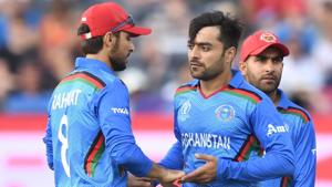 File image of Afghanistan's Rashid Khan celebrating a wicket with teammates.(AFP) File image of Afghanistan's Rashid Khan celebrating a wicket with teammates.(AFP)