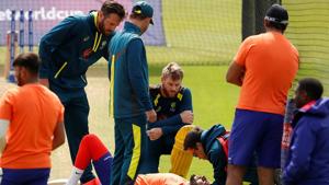A net bowler receives treatment after being hit on the head while Australia's David Warner was batting.(Action Images via Reuters) A net bowler receives treatment after being hit on the head while Australia's David Warner was batting.(Action Images via Reuters)