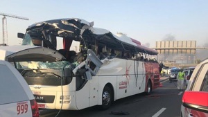 The low-clearance signboard that hangs over a car-only off-ramp of the Sheikh Mohammed bin Zayed Road, a major highway in Dubai, smashed through the left side of the bus and killed almost everyone seated on that side. (Photo Credit: Dubai Police) The low-clearance signboard that hangs over a car-only off-ramp of the Sheikh Mohammed bin Zayed Road, a major highway in Dubai, smashed through the left side of the bus and killed almost everyone seated on that side. (Photo Credit: Dubai Police)