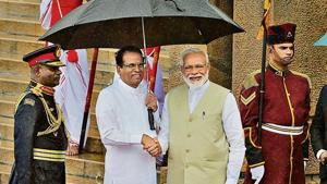 Prime Minister Narendra Modi, center is received by the Sri Lankan President Maithripala Sirisena, center left, upon his arrival at the presidential secretariat in Colombo, Sri Lanka(AP Photo) Prime Minister Narendra Modi, center is received by the Sri Lankan President Maithripala Sirisena, center left, upon his arrival at the presidential secretariat in Colombo, Sri Lanka(AP Photo)
